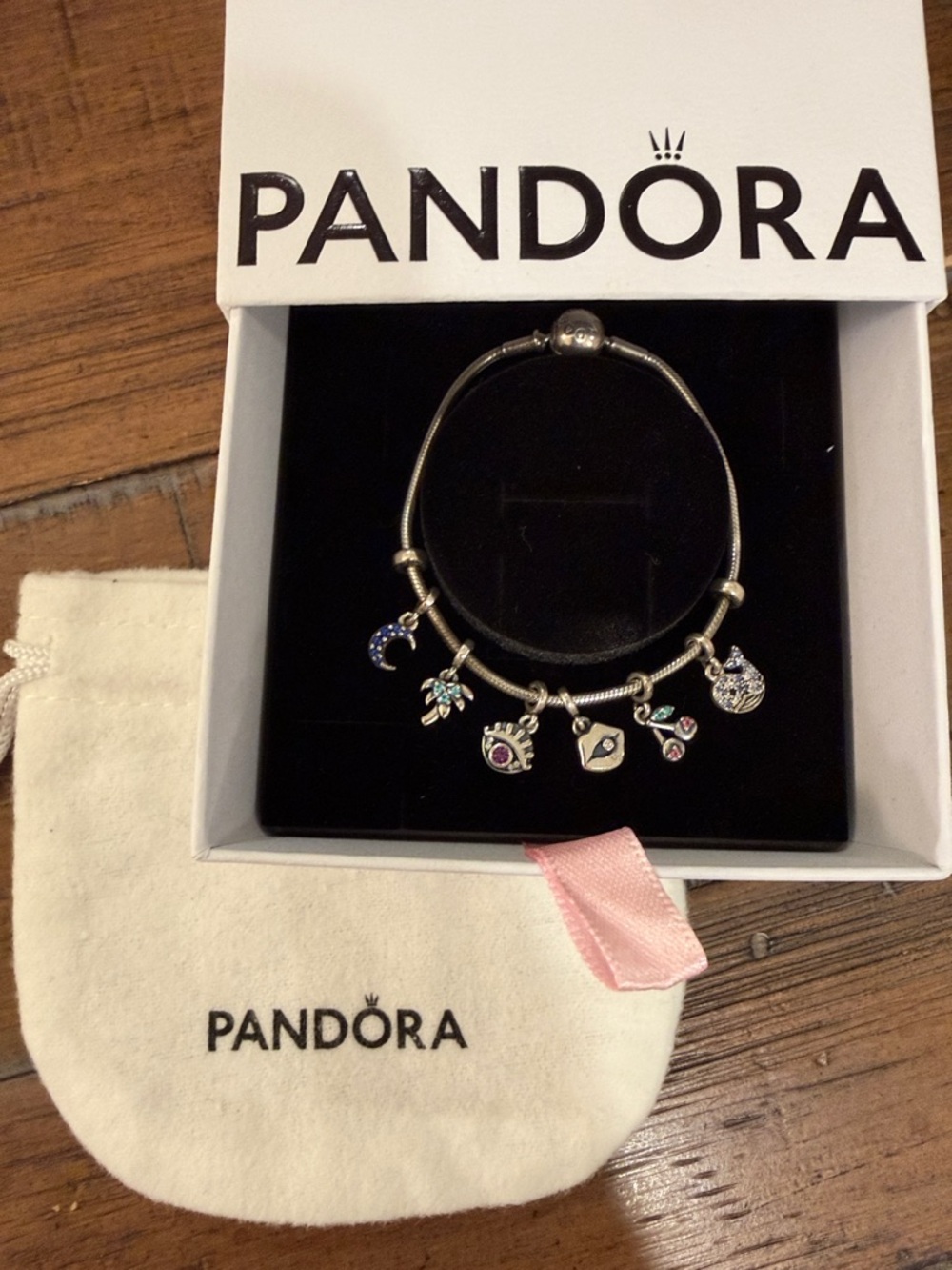 Pandora Me bracelet with 6 charms and 2 spacers